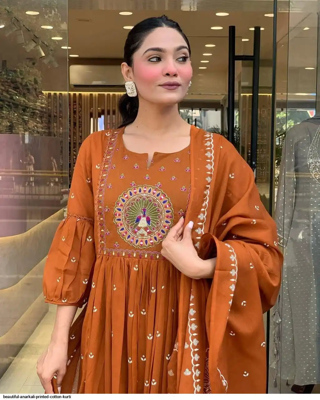 Latest And Trending Peacock Cotton Printed Anarkali And Pant With Dupatta Set ( Orange )